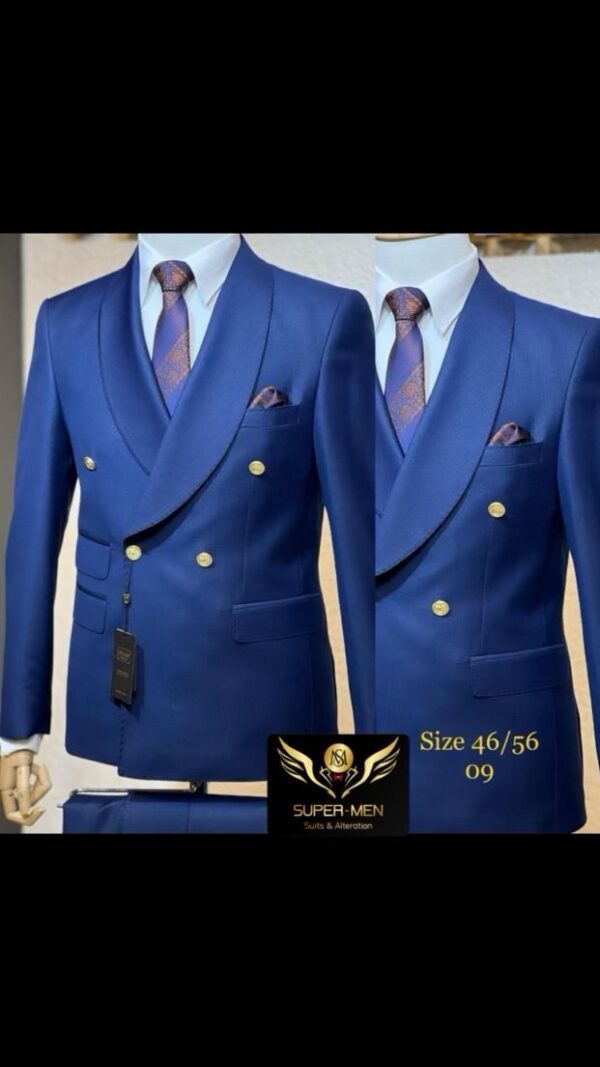 Blue double breasted suit with gold buttons